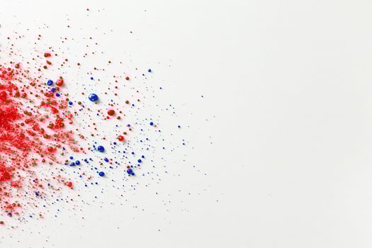 Red, white and blue paint splatter on a white background photo
