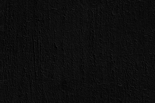 Texture of rough black plaster. Architectural abstract dark background. photo