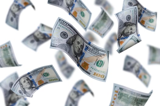 Flying dollars banknotes isolated on a white background. Money is flying in the air. 100 US banknotes new sample. photo