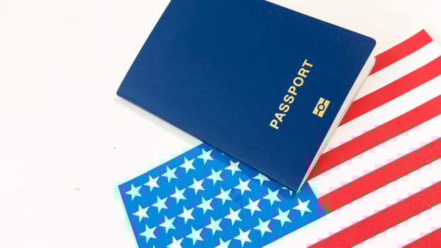 US passport issued to citizen and national of the United States of America to travel in most countries outside with USA flag photo