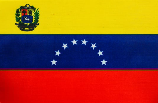 Flag of Venezuela displayed with vibrant colors and symbols photo