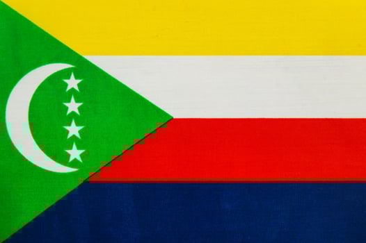 Flag of Comoros with vibrant color stripes photo
