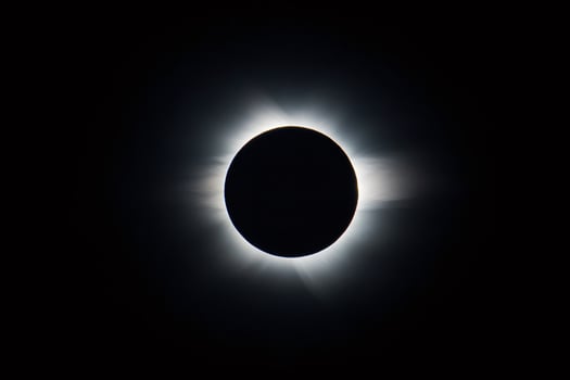 Total solar eclipse showing corona and chromosphere photo