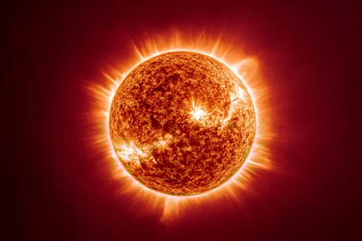 Sun emitting solar flares and prominences in outer space photo