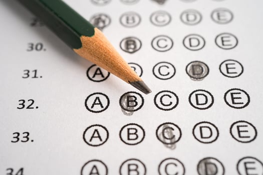 Answer sheets with pencil drawing photo