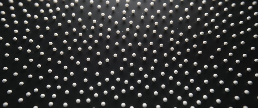 A black and white photo of a bunch of white dots