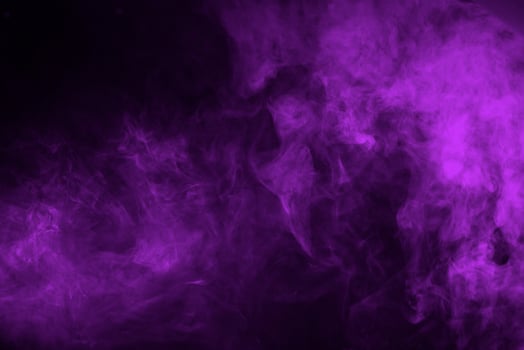 Lilac Smoke on a Black Background photo