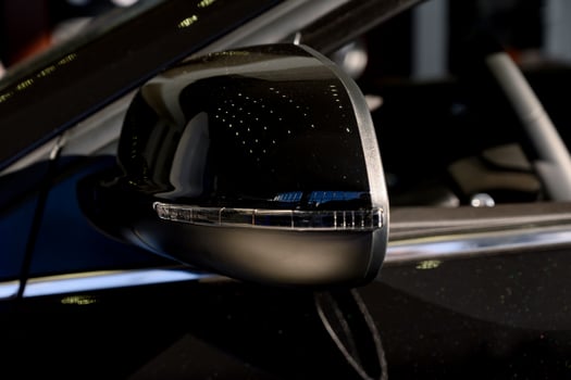 A car side mirror in a close up photo