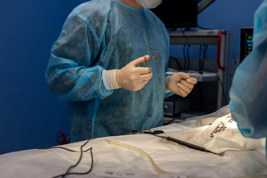 A man in a surgical gown photo