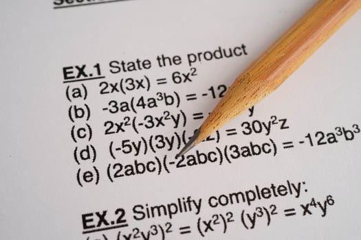 Pencil on mathematic formula exercise test paper in education sch photo