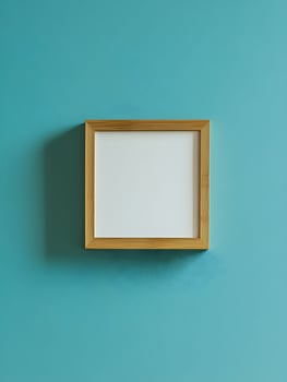Modern blank frame for wall art mockup showcasing a stylish empty space on a vibrant turquoise wall, perfect for interior design inspiration and creative projects photo