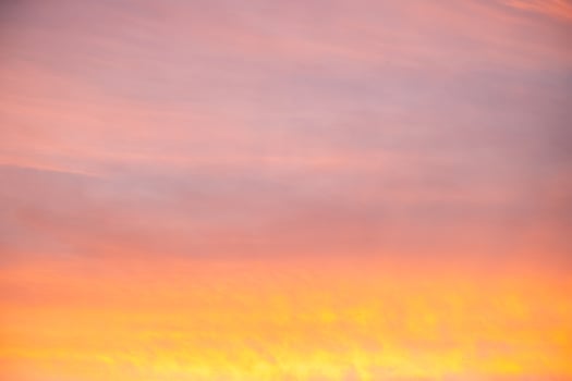 Beautiful , luxury soft gradient orange gold clouds and sunlight on the blue sky perfect for the background, take in evening,Twilight, Large size, high definiti photo