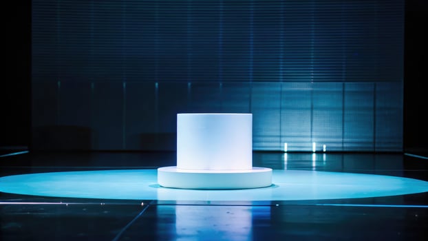 A minimalist stage with a single white podium. photo