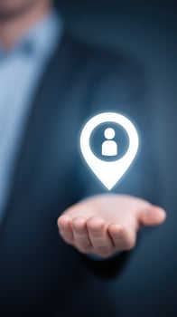 Businessman holding map pin icon on hand photo