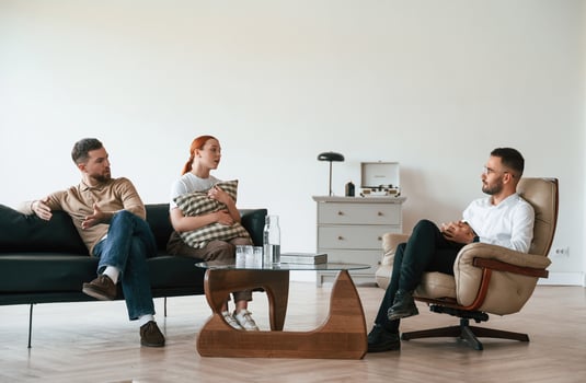 Family issues... Couple at a psychologist's appointment photo