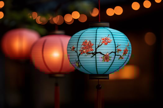 Colorful chinese paper lanterns hanging at night creating a festive atmosphere photo