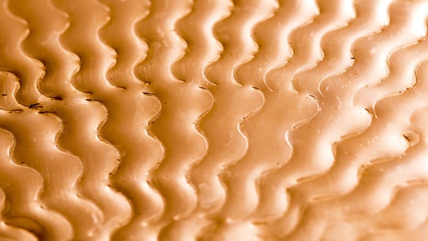 A close up of a wavy pattern on a surface photo