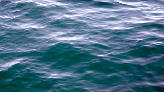 The surface of the ocean is blue and green photo