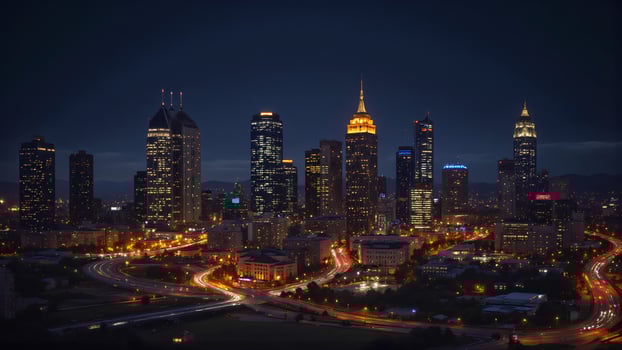 Nighttime Cityscape with Illuminated Skyscrapers and Traffic Lights photo