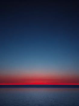 Peaceful horizon with a gradient of colors at sunset. photo