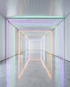Illuminated tunnel with rainbow-colored LED strips. photo