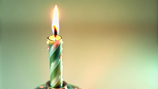 Green Candle with a Burning Flame photo