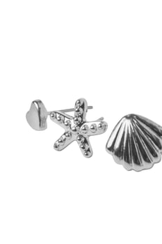 Elegant silver stud earrings featuring seashell starfish and heart designs photo