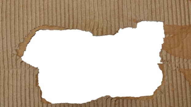 Torn Brown paper box texture or cardboard with torn for design background photo