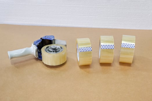 dispenser and stack of reel of scotch tape photo