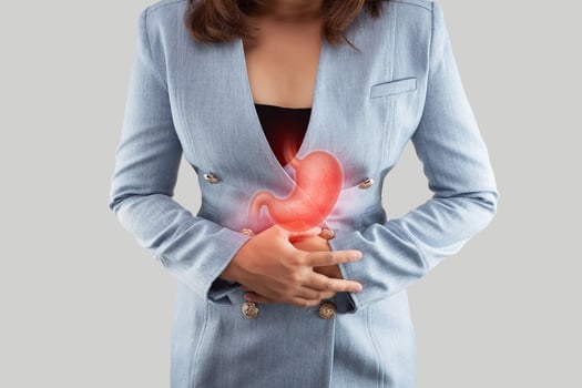 Stomach discomfort indicated. Possible stomach ache. photo