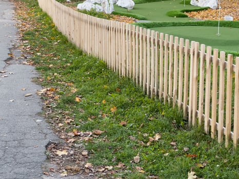 old wooden garden fence in autumn photo