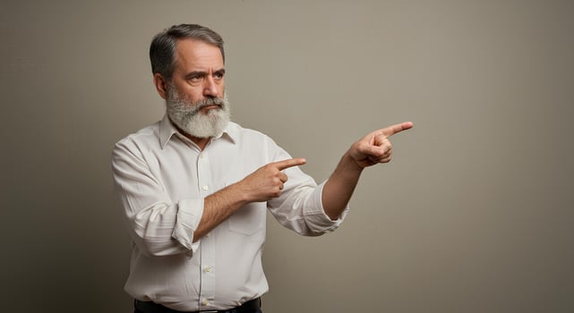 Mature Man in White Shirt Pointing to the Right photo