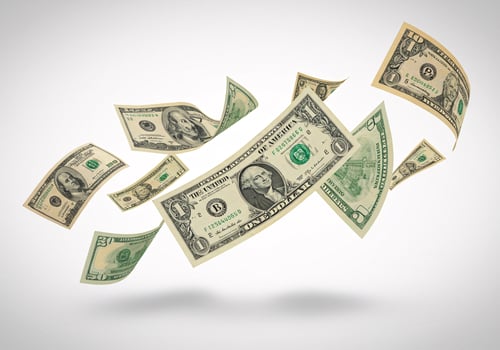 Hundred Dollar Bills Floating on White Background photo