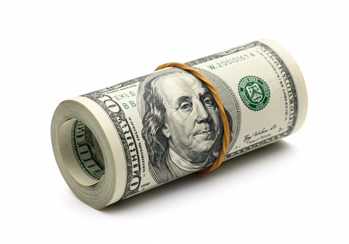 Rolled Dollar Bills on White Background photo