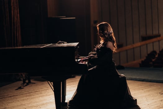 Elegant woman Pianist in Dramatic Light photo