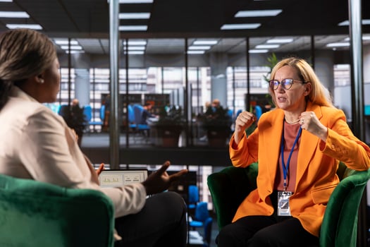 Diverse team of female entrepreneurs collaborating in a meeting, promoting gender equality and career progression in a men dominated business industry. Empowerment and leadership skills. photo