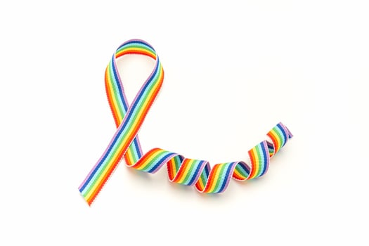 Rainbow cloth ribbon on a white background. Tov view. photo