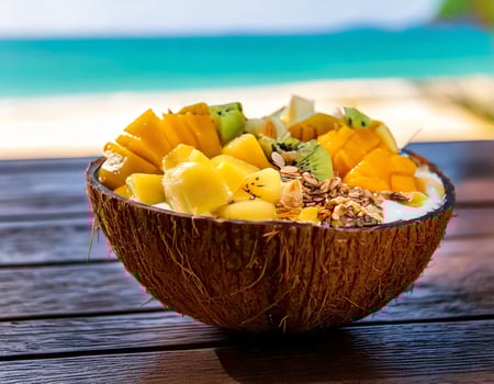 A bowl of fruit on a table photo