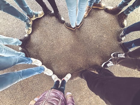 Circle of Feet Forming Heart Shape - Friendship and Unity Concept photo