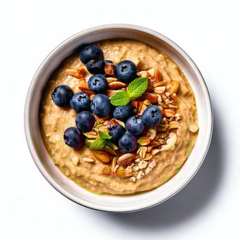 Oatmeal with blueberries and almonds in a bowl photo
