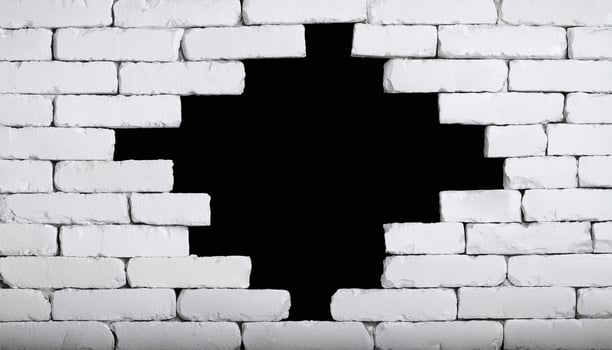 White Wall with Black Hole photo
