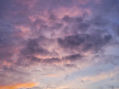 Purple stormy evening sky at sunset in early spring photo