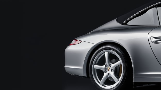 Silver car with a black background photo