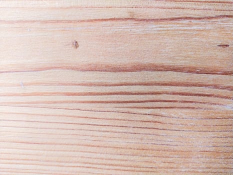 Detailed wood grain texture. Light, natural wood surface showcasing organic patterns. Ideal for backgrounds, designs, or texture overlays for a rustic or minimalist feel. photo