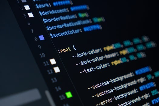 close-up of computer screen with colorful css code, focus on root selector, web development, frontend design and programming photo