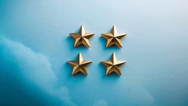 Four golden stars showing positive feedback rating on blue background photo