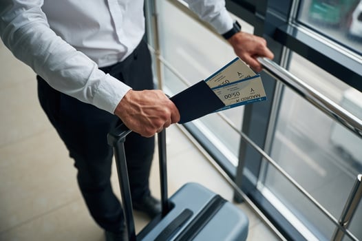 Close up,, view of man with luggage and in formal clothes, conception of airport travel photo