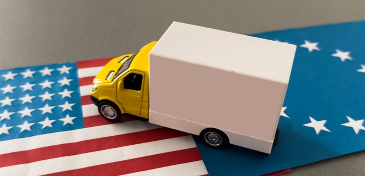 A USA-marked shipping container on a truck, illustrating American international trade photo