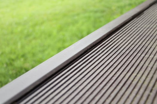 Outdoor plastic composite brown floor. Renovation terrace photo