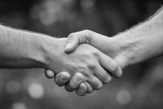 Moment of Connection A CloseUp Handshake Captured on Film photo